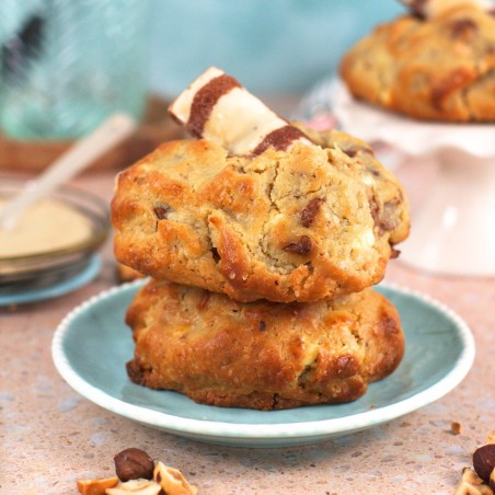 Kinderella | NY Cookies con avellanas, barquillos, Chocolate blanco y con leche rellena de crema de leche y avellanas